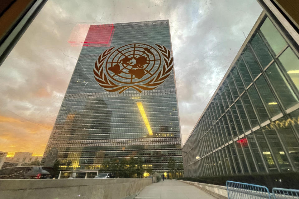 FILE - The United Nations headquarters building is seen from inside the General Assembly hall, Tuesday, Sept. 21, 2021. Western nations engaged in intense behind-the-scenes lobbying for a U.N. resolution that would condemn Russia’s “attempted illegal annexation” of four Ukrainian regions and demand that Moscow immediately reverse its actions, while Syria warned against isolating its ally Russia. A vote on the resolution is expected later Wednesday, Oct. 12, in the 193-member General Assembly after diplomats finish outlining their country’s positions. Assembly members began debating it on Monday at the resumption of an emergency special session on Ukraine. (Eduardo Munoz/Pool Photo via AP)