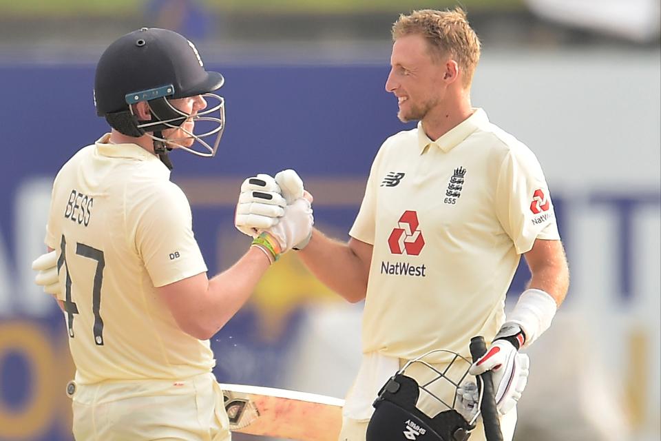 Dom Bess congratulates Joe Root on reaching 150 (SLC)