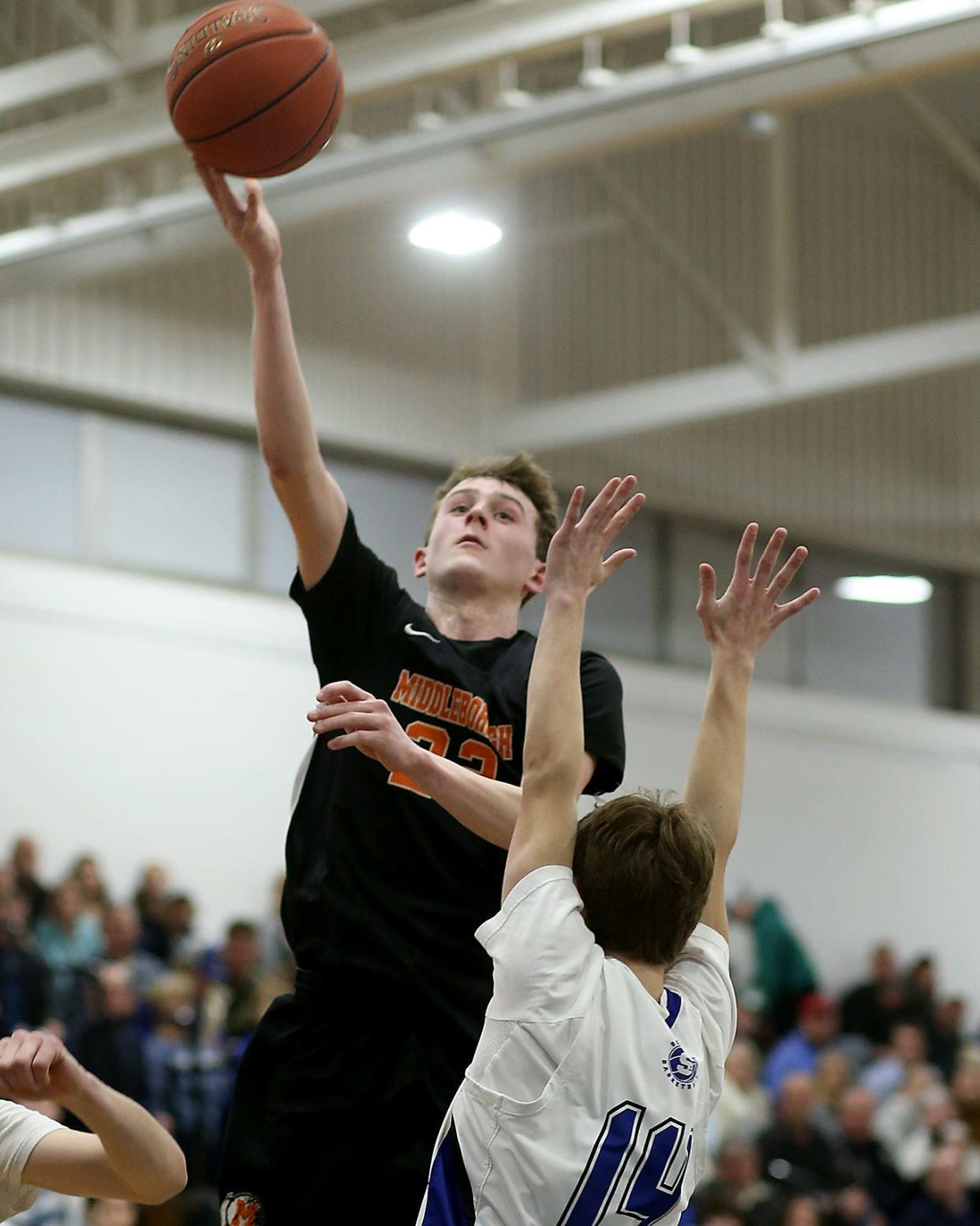 Middleborough's Matt Youngquist goes up for a layup to cut Scitaute’s lead to 21-12 during second quarter action of their game in the Round of 32 game in the Division 2 state tournament at Scituate High on Thursday, March 2, 2023.