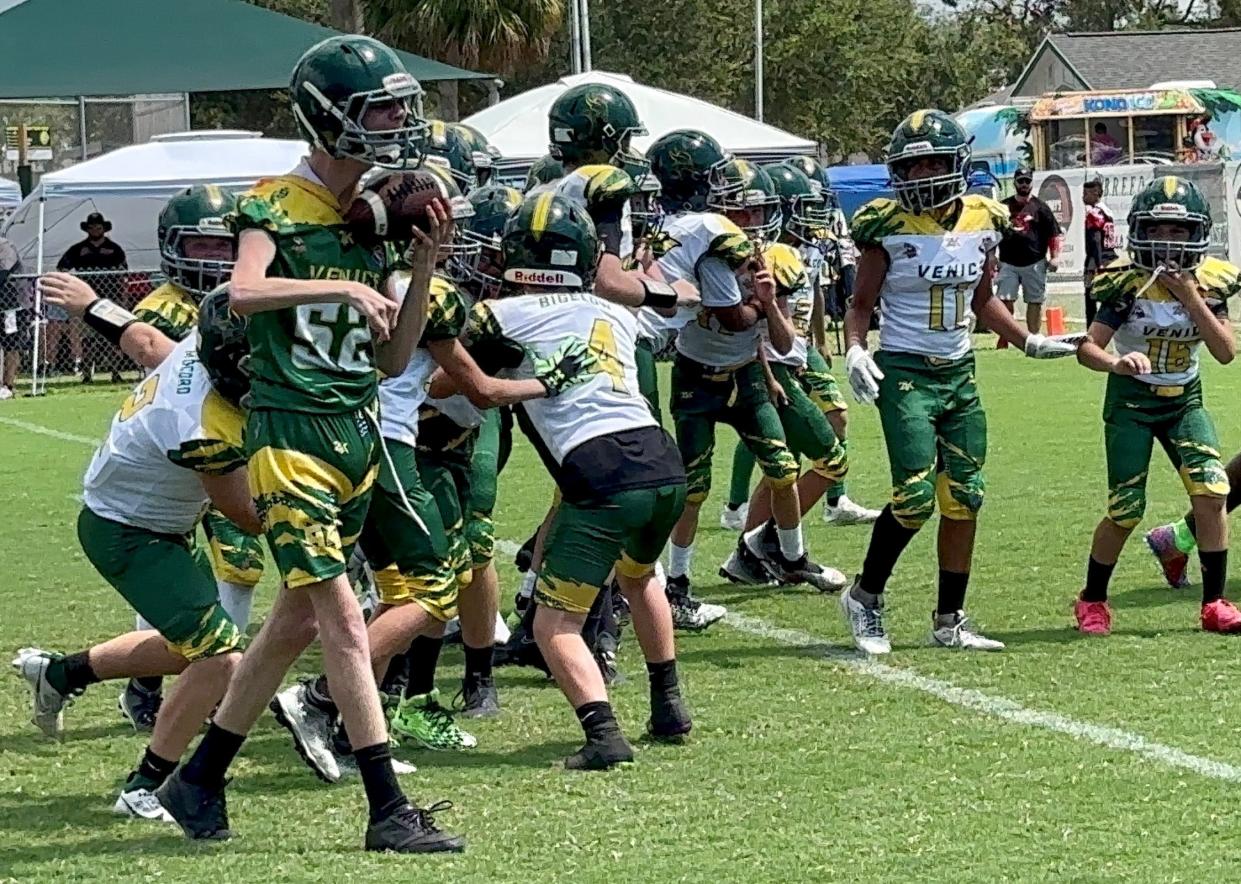 TOUCHDOWN! Cody Walker takes the handoff and charges 5 yards for a touchdown for the Venice Vikings during a Pop Warner football game on Sept. 16 against Port Charlotte. Cody, who battles cerebral palsy and epilepsy, entered the game after the crowd started chanting, "Cody, Cody, Cody." Jamie Fraser, president of the Vikings Football & Cheer Program, helped to orchestrate the special moment. "The unwavering dedication of Cody's parents and the countless others who contributed to this remarkable moment are a testament to the power of community and love." Cody, 19, is a student at Oak Park School.