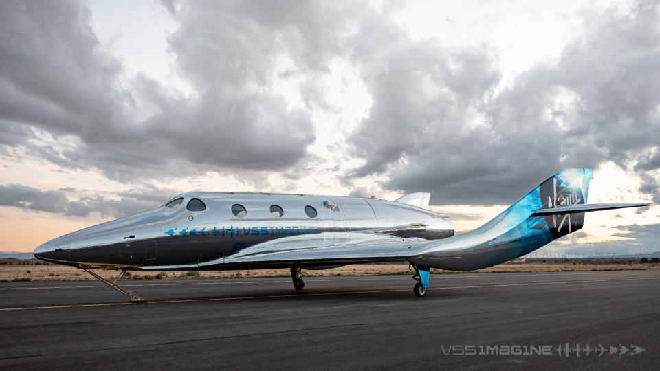 In this undated photo provided by Virgin Galactic is the VSS Imagine, the first SpaceShip III in the Virgin Galactic Fleet in Mojave, Calif. Virgin Galactic rolled out its newest spaceship Tuesday, March 30, 2021, as the company looks to resume test flights in the coming months at its headquarters in the New Mexico desert. Company officials said it will likely be summer before the ship undergoes glide flight testing at Spaceport America in southern New Mexico. (Virgin Galactic via AP)