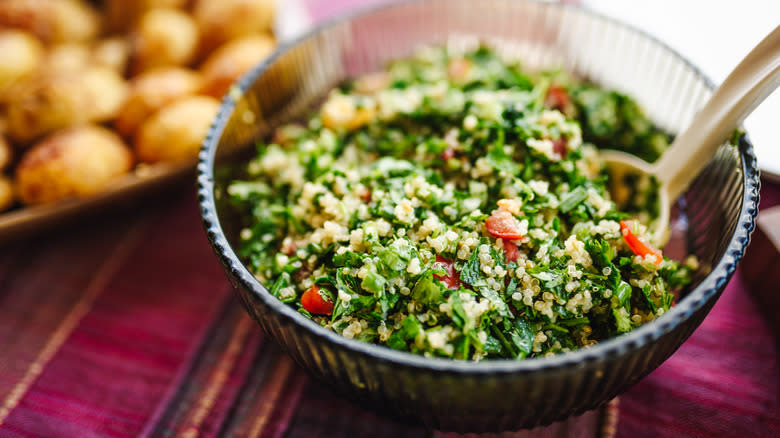 tabbouleh salad next to potatoes