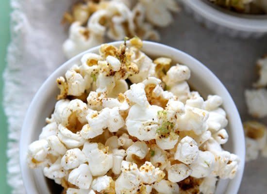 <strong>Get the <a href="http://withstyle.me/2012/05/04/cinco-de-mayo-chili-lime-popcorn/" target="_hplink">Chili-Lime Popcorn recipe</a> by With Style</strong>    A bit of chili makes this popcorn spicy and the lime keeps it nice and refreshing, making this a perfect snack for a summertime outdoor gathering.