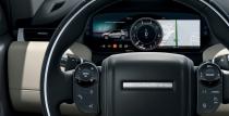 <p>The three-spoke steering wheel can be outfitted with touch-sensitive controls in faux suede.</p>