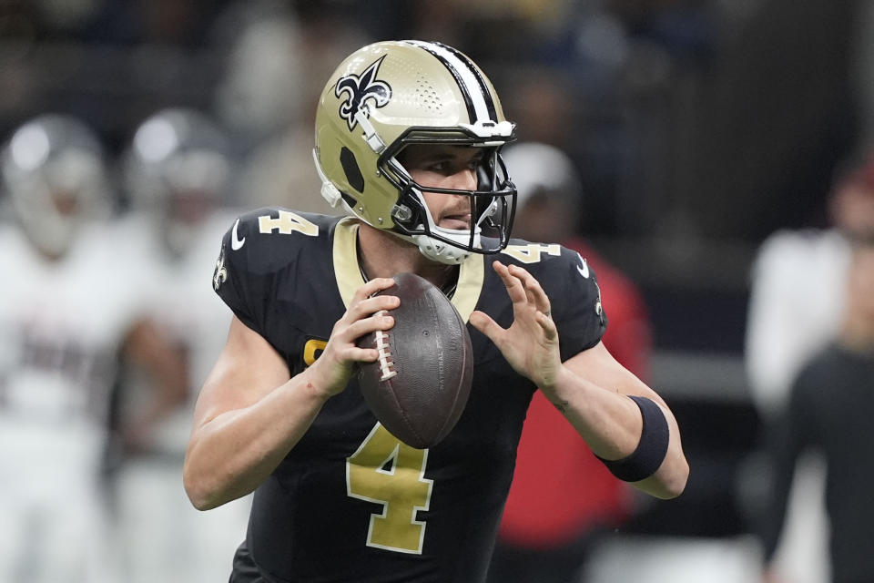 New Orleans Saints quarterback Derek Carr (4) sets back to pass in the first half of an NFL football game against the Atlanta Falcons in New Orleans, Sunday, Jan. 7, 2024. (AP Photo/Gerald Herbert)