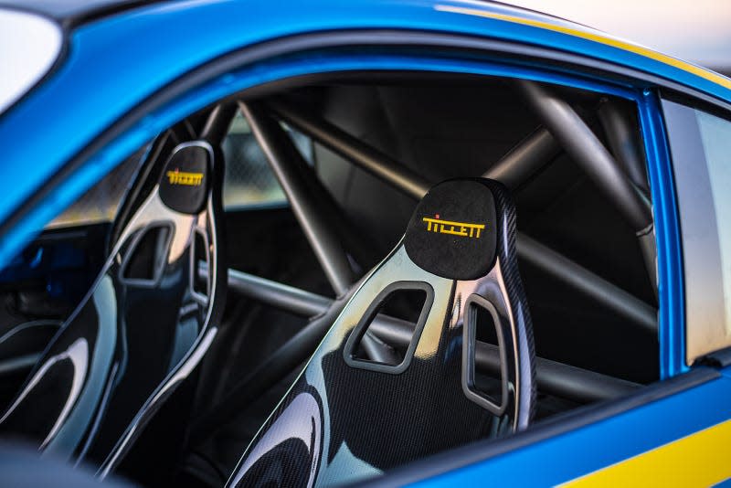 Interior view looking at seats and roll cage of Porsche 911 GT3 STI built by DevSpeed Motorsports for Eneos.