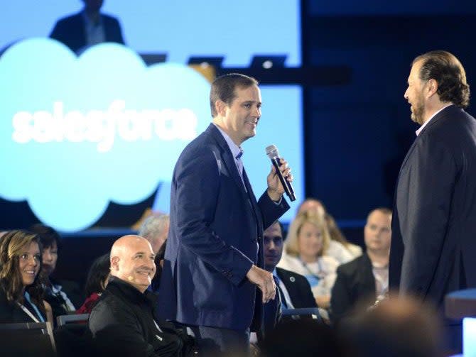 <p>Chuck Robbins CEO of Cisco Sytems (L) and Marc Benioff speak at the Salesforce keynote during Dreamforce 2015</p> (Getty Images)