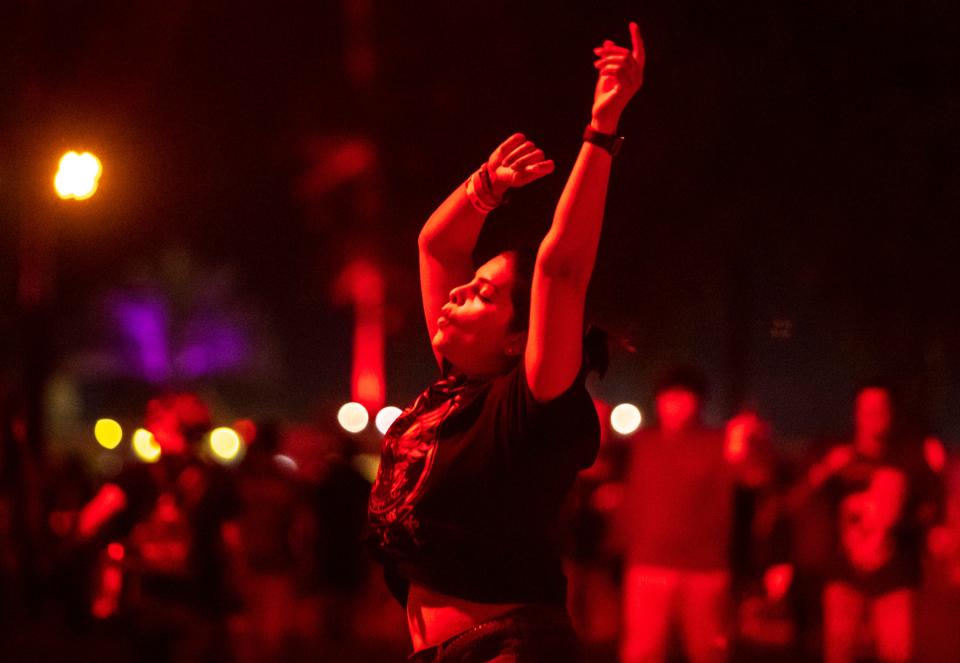 Nikitha Omkar of San Jose dances to "Have a Drink on Me" during the Power Trip Music Festival at the Empire Polo Club in Indio, Calif., Saturday, Oct. 7, 2023. "This is a life changing moment for me," she explained after the song ended. "I can die now and go to heaven and not give a f---!"