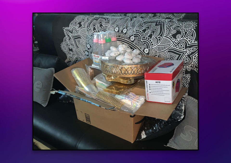 A box of baby shower items sits, untouched, on the author's couch after her event had to be canceled. (Photo courtesy of Kamilah Newton)