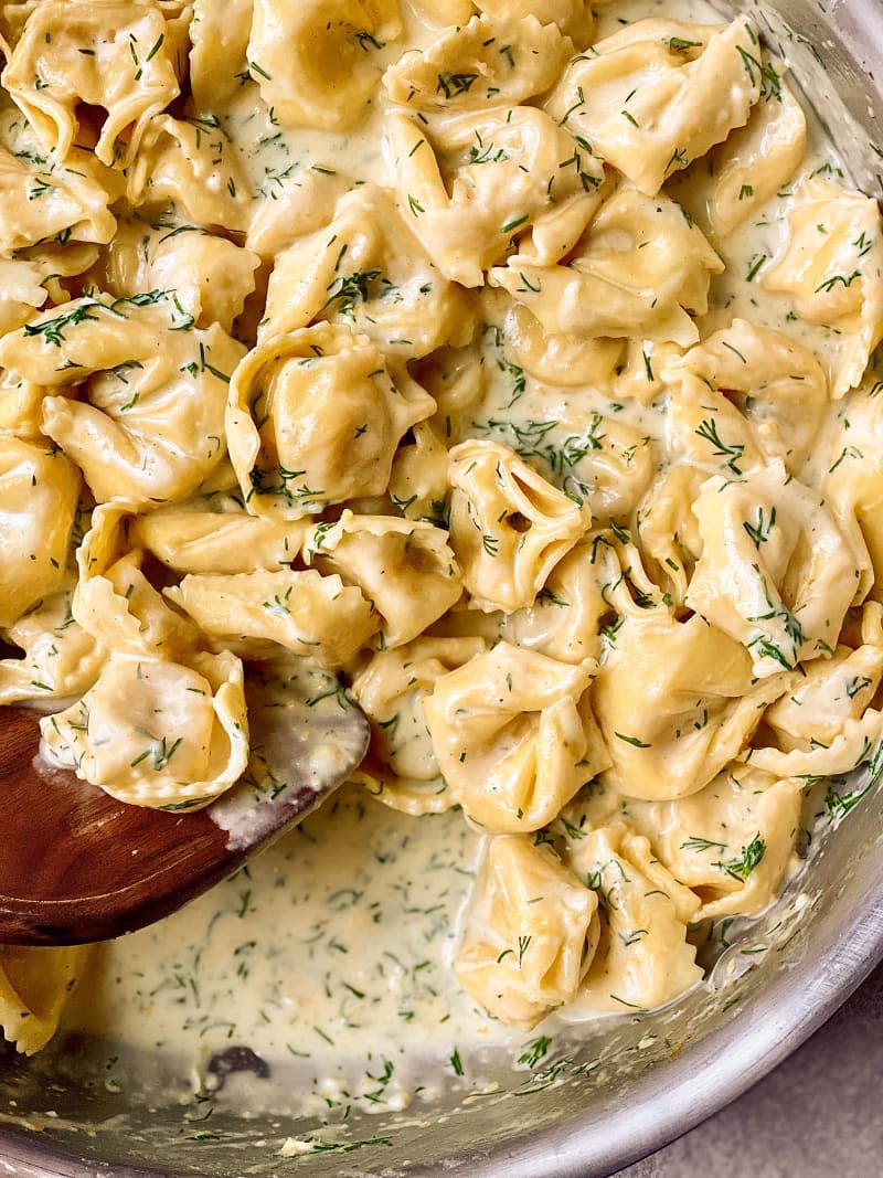 Lemon dill tortellini in skillet.