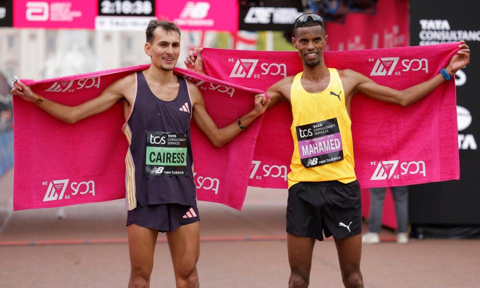 <span>Emile Cairess (left) and Mahamed Mahamed pose together after the race.</span><span>Photograph: Tom Jenkins/The Guardian</span>