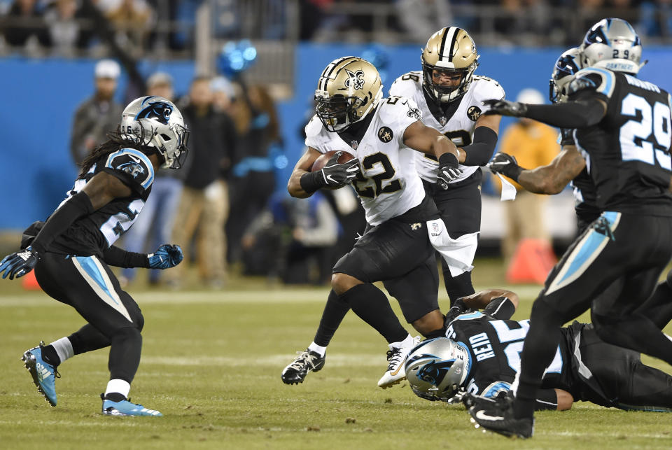 New Orleans Saints' Mark Ingram (22) runs against the Carolina Panthers in the first half of an NFL football game in Charlotte, N.C., Monday, Dec. 17, 2018. (AP Photo/Mike McCarn)