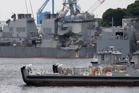 The Arleigh Burke-class guided-missile destroyer USS Fitzgerald, damaged by colliding with a Philippine-flagged merchant vessel, is seen at the U.S. naval base in Yokosuka, Japan June 18, 2017. REUTERS/Toru Hanai