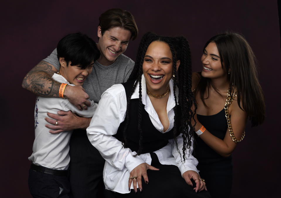 Andre Dae Kim, fro left, Kieron Moore, Sisi Stringer and Daniela Nieves pose for a portrait to promote "Vampire Academy" on day two of Comic-Con International on Friday, July 22, 2022, in San Diego. (AP Photo/Chris Pizzello)