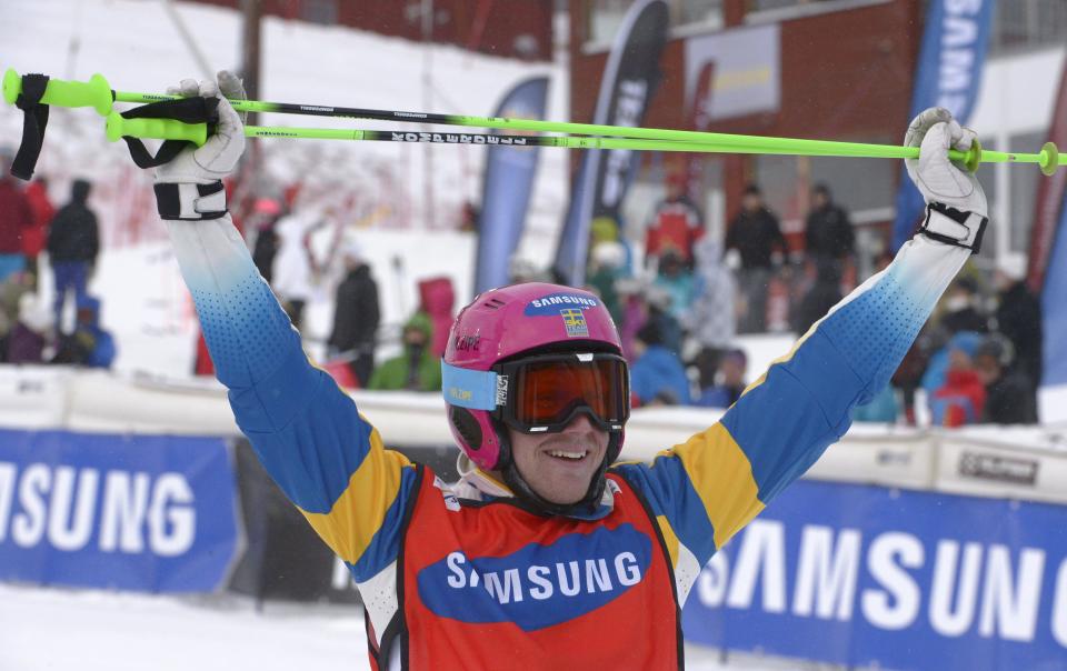 Sweden's Victor Ohling Norberg jubilates after winning the men's FIS Ski Cross World Cup in Are, Sweden, Saturday March 15, 2014. (AP Photo/Janerik Henriksson) SWEDEN OUT