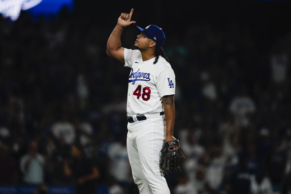 Los Angeles Dodgers relief pitcher Brusdar Graterol reacts after striking out Colorado Rockies' Ryan McMahon to end the baseball game Thursday, Aug. 10, 2023, in Los Angeles. (AP Photo/Ryan Sun)