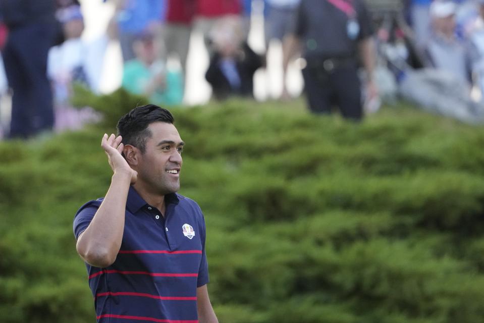 Team USA's Tony Finau reacts after winning a four-ball match the Ryder Cup at the Whistling Straits Golf Course Friday, Sept. 24, 2021, in Sheboygan, Wis. (AP Photo/Jeff Roberson)