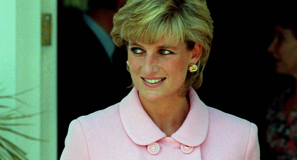 Diana, who features as a character in The Crown, pictured wearing a pink Versace suit during an official visit to Argentina on November 24, 1995. (Getty Images)