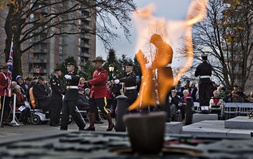 An Eternal Flame burns during Remembrance Day ceremonies at the War Memorial in North Vancouver