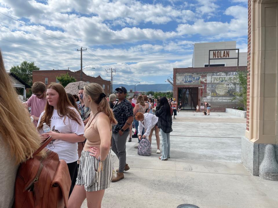 People waiting in line for Jeffree Star store on a concrete walkway