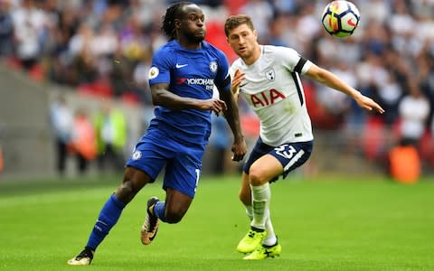 Victor Moses of Chelsea and Ben Davies of Tottenham Hotspur battle for possession during the Premier League match between Tottenham Hotspur and Chelsea at Wembley Stadium - Credit: GETTY IMAGES