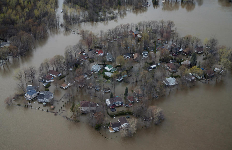 An overhead view showing the flooded residential neighborhood of Ile Mercier, Quebec