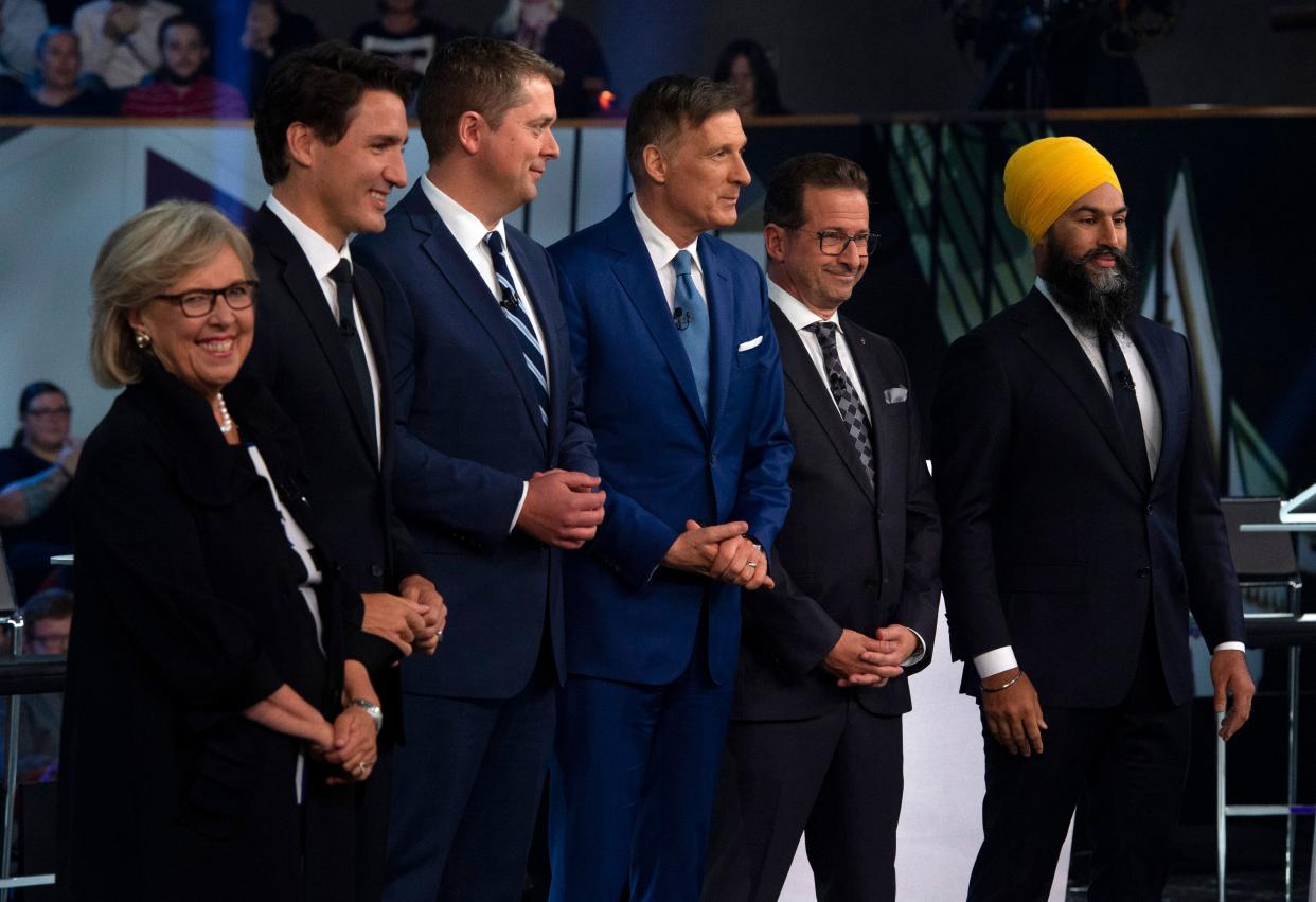 (From L) Green Party leader Elizabeth May, Liberal leader Justin Trudeau, Conservative leader Andrew Scheer, People's Party of Canada leader Maxime Bernier, Bloc Quebecois leader Yves-Francois Blanchet and NDP leader Jagmeet Singh pose for a photograph before the Federal Leaders Debate in Gatineau, Quebec on October 7, 2019. (Photo by Sean Kilpatrick / POOL / AFP) (Photo by SEAN KILPATRICK/POOL/AFP via Getty Images)