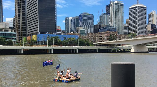 Mates made a raft and floated down the Brisbane River. Source: 7 News