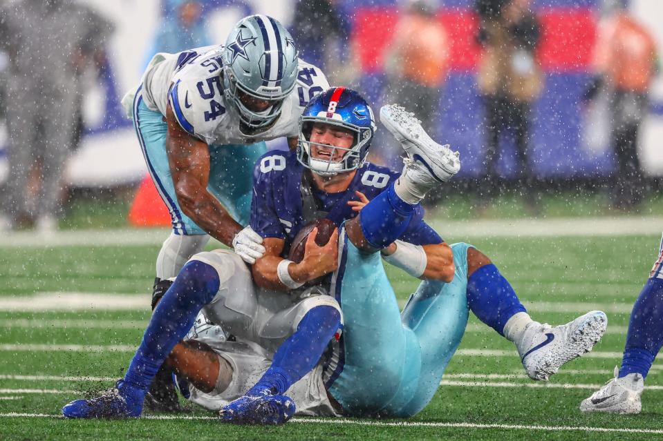 Dallas linebacker Micah Parsons blasts New York Giants quarterback Daniel Jones during Sunday's 40-0 win at MetLife Stadium. The Cowboys host the New York Jets Sunday.