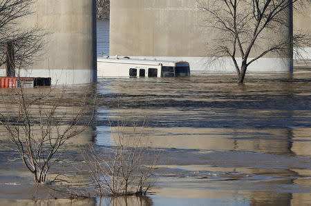 FILE PHOTO: A motorhome is flooded in Marysville, California, after an evacuation was ordered for communities downstream from the dam in Oroville, California, U.S., February 14, 2017. REUTERS/Jim Urquhart/File Photo