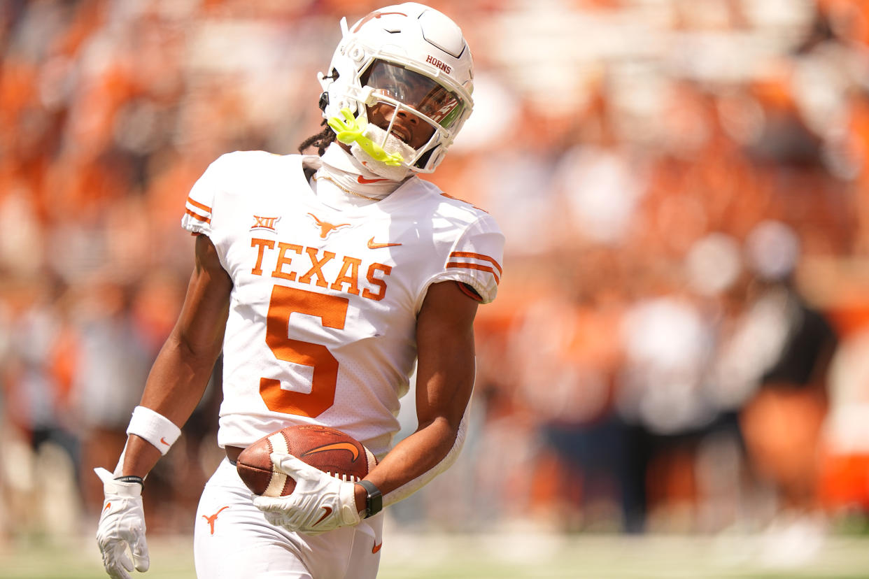 College Football: Texas Adonai Mitchell (5) in action, runs with the football during a spring exhibition game at Darrell K Royal Stadium. 
Austin, TX 4/15/2023
CREDIT: Erick W. Rasco (Photo by Erick W. Rasco /Sports Illustrated via Getty Images) 
(Set Number: X164345 TK1)