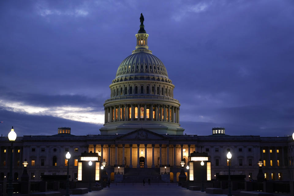 In this Oct. 6, 2021, photo, the light in the cupola of the Capitol Dome is illuminated, indicating that work continues in Congress, in Washington. The dangerous standoff in Congress over raising the debt limit as well as its ultimate resolution both were engineered by Sen. Mitch McConnell, the Republican leader determined to stop President Joe Biden’s agenda even if it pushes the country toward grave economic uncertainty. McConnell is no longer the majority leader of the Senate, but he is exerting the power of the minority in new and uncharted ways. (AP Photo/J. Scott Applewhite)