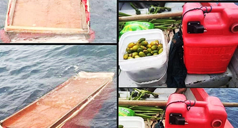 A wooden coffin floats in the ocean and a red gasoline tank is pictured.