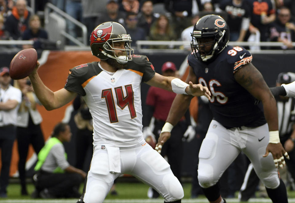 Chicago Bears defensive end Akiem Hicks (96) chases down Ryan Fitzpatrick, before he got ejected from Sunday's game. (AP)