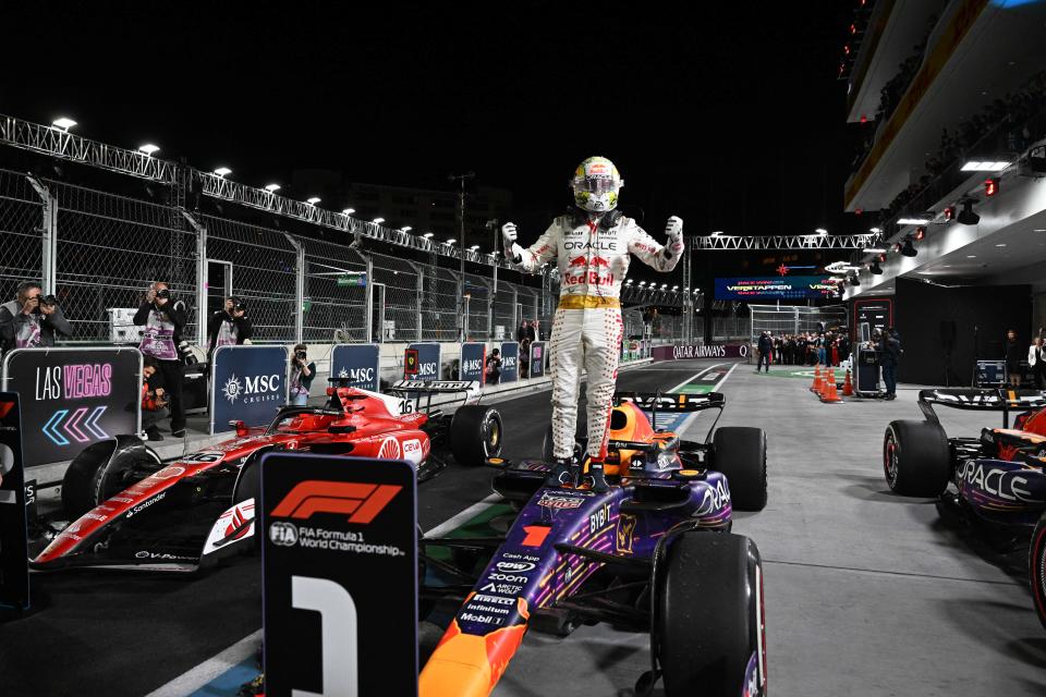 Max Verstappen—in an Elvis-inspired race suit—celebrates his win.