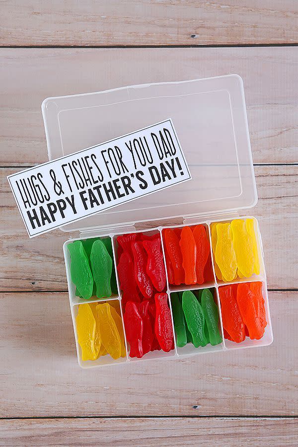 father's day crafts, plastic box with red, green, yellow and orange swedish fish inside