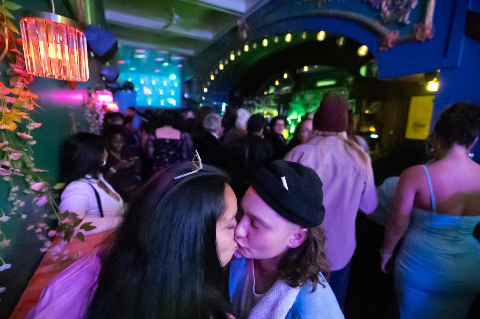 Myriam Serrano and Crystal Brown kiss during Queer Prom night.