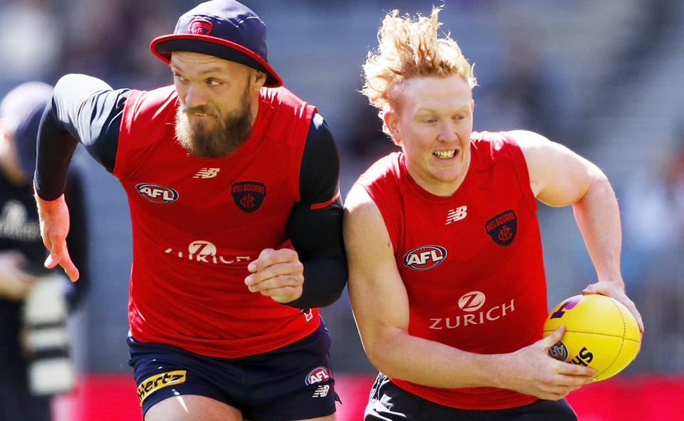Max Gawn and Clayton Oliver, pictured here at a Melbourne Demons training session.
