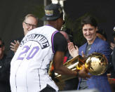 Toronto Raptors guard Kyle Lowry shows the Larry O'Brien championship trophy to Canadian prime minister Justin Trudeau during a rally at Toronto city hall Nathan Phillips Square. (Photo by John E. Sokolowski-USA TODAY Sports)