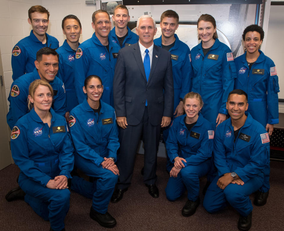 Vice President Mike Pence spoke during a ceremony to announced NASA's newest astronaut class, on June 7, 2017. He is shown here with the new astronaut candidates. <cite>NASA/Bill Ingalls</cite>