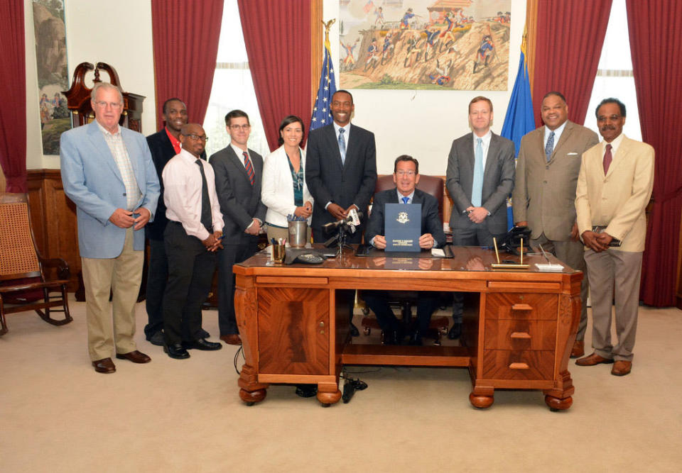 <div class="inline-image__caption"><p>Doug with Governor Malloy and others at Glanville Law Signing.</p></div> <div class="inline-image__credit">Doug Glanville</div>