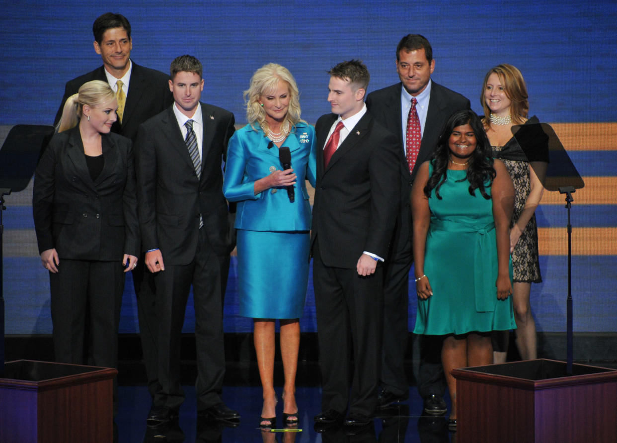 Cindy McCain, wife of Republican presidential nominee, stands on stage with family members during the Republican National Convention 2008 at the Xcel Energy Center in St. Paul, Minnesota, on September 04, 2008. From L-R: Andrew, Meghan, Jimmy, Cindy, Jack, Doug, Bridget and Sydney.   AFP PHOTO Paul J. RICHARDS (Photo credit should read PAUL J. RICHARDS/AFP/Getty Images)