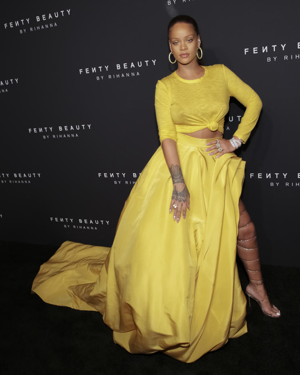 <p>Only Rihanna could pull off a full yellow look. Her custom Oscar de la Renta crop top and balloon skirt were the talk of the week.<br><i>[Photo: AP]</i> </p>