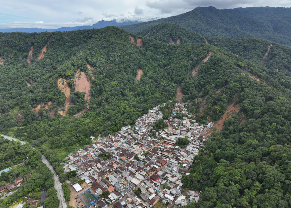 The community near Barra do Sahi beach after deadly landslides were triggered by heavy rain in the coastal city of Sao Sebastiao, Brazil, Wednesday, Feb. 22, 2023. (AP Photo/Andre Penner)