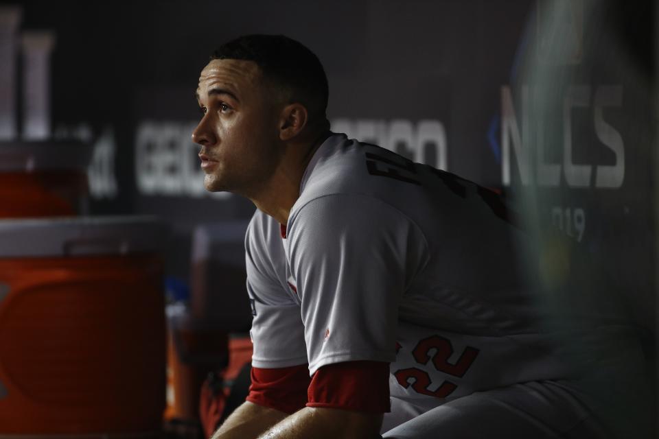 St. Louis Cardinals starting pitcher Jack Flaherty sits in the dugout after the Washington Nationals scored four runs during the third inning of Game 3 of the baseball National League Championship Series Monday, Oct. 14, 2019, in Washington. (AP Photo/Patrick Semansky)