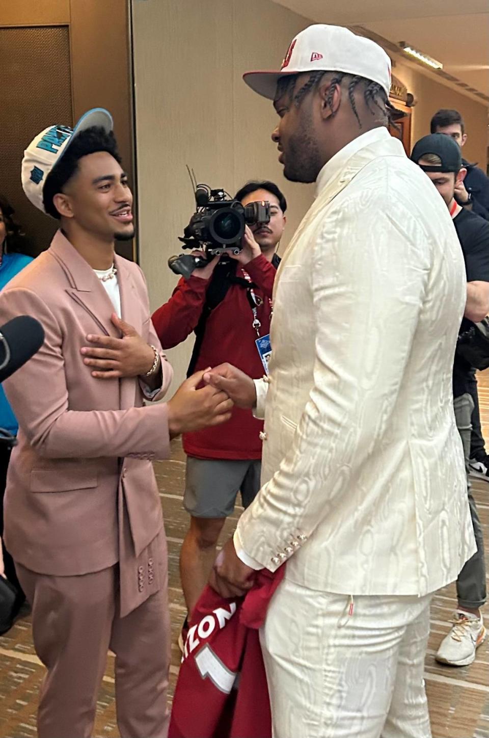 Quarterback Bryce Young (left) congratulates offensive tackle Paris Johnson Jr. on being drafted in the first round of the 2023 NFL Draft Thursday, April 27, 2023. Young was drafted No. 1 overall by the Carolina Panthers. Johnson was drafted No. 6 overall by Arizona.