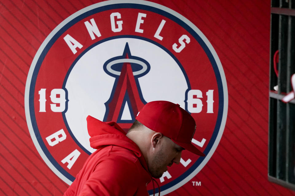 Los Angeles Angels center fielder Mike Trout leaves the dugout before a baseball game against the Philadelphia Phillies, Tuesday, April 30, 2024, in Anaheim, Calif. (AP Photo/Ryan Sun)
