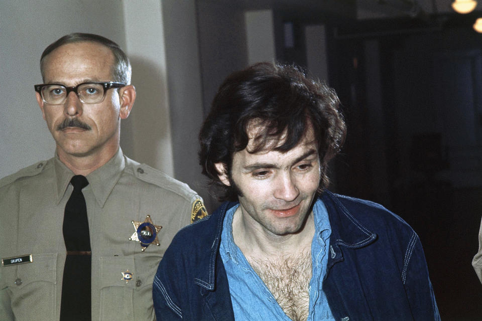 <p>Charles Manson, accused murderer in the Sharon Tate murder case in Los Angeles, is shown clean-shaven and with a haircut, on Nov. 10, 1970. (Photo: AP) </p>