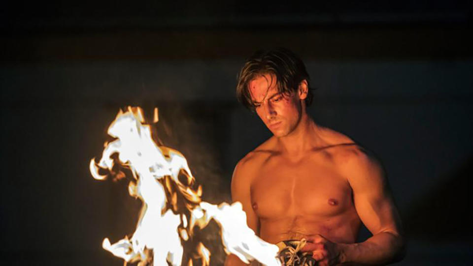 Lincoln Younes in Last King of the Cross by a fire