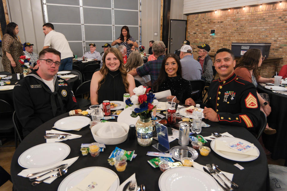 Veteran families share a meal May 18 at the BOOM Adventures Armed Forces Day Banquet in Amarillo.